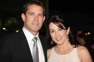 Formal portrait of a man and woman at a red-carpet event representing a biography article about Constantine Yankoglu and Patricia Heaton's early relationship.